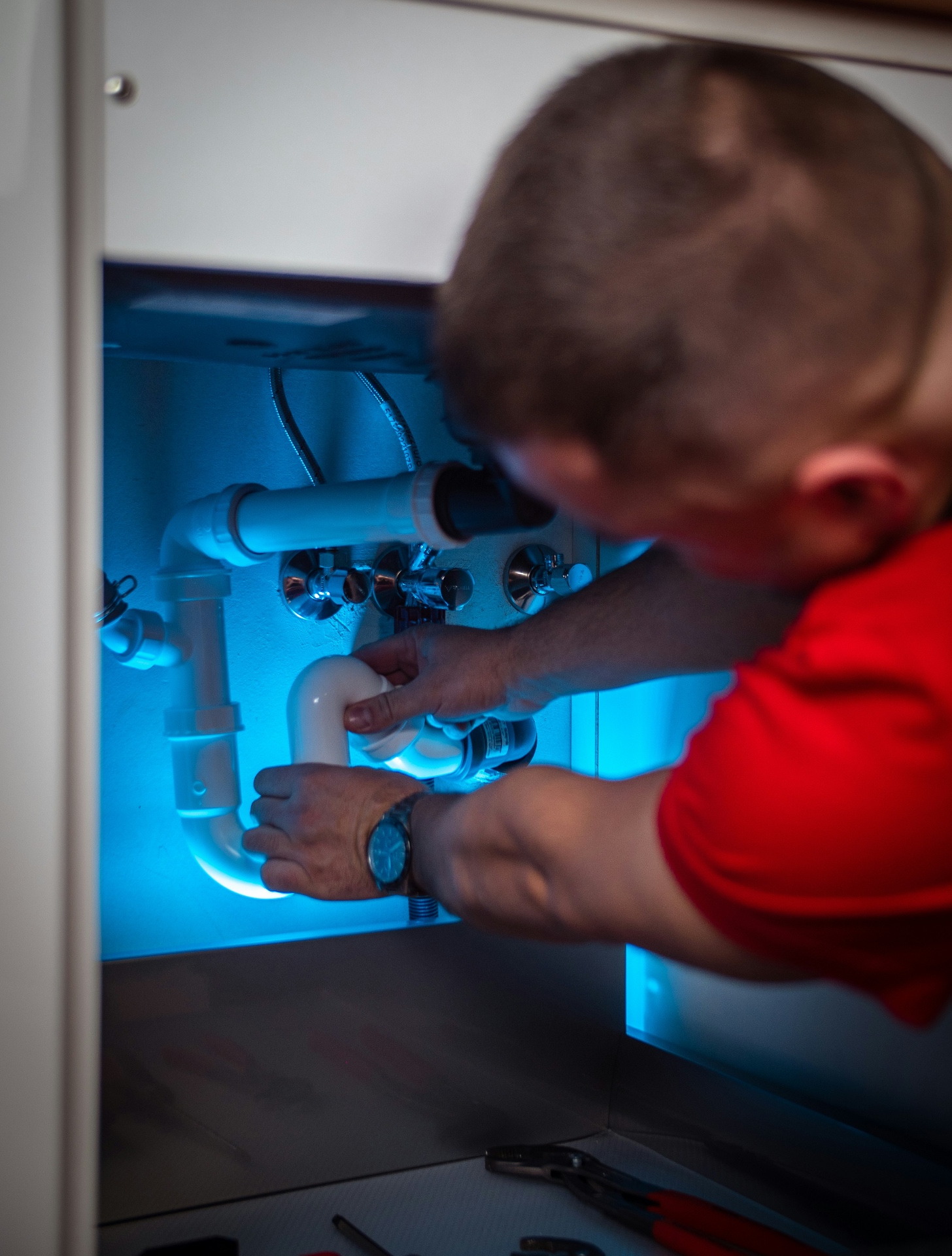Skilled plumber working demonstrating expert trades craftsmanship